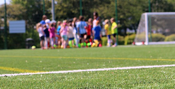 Fotbolsspelare på en fotbollsplan